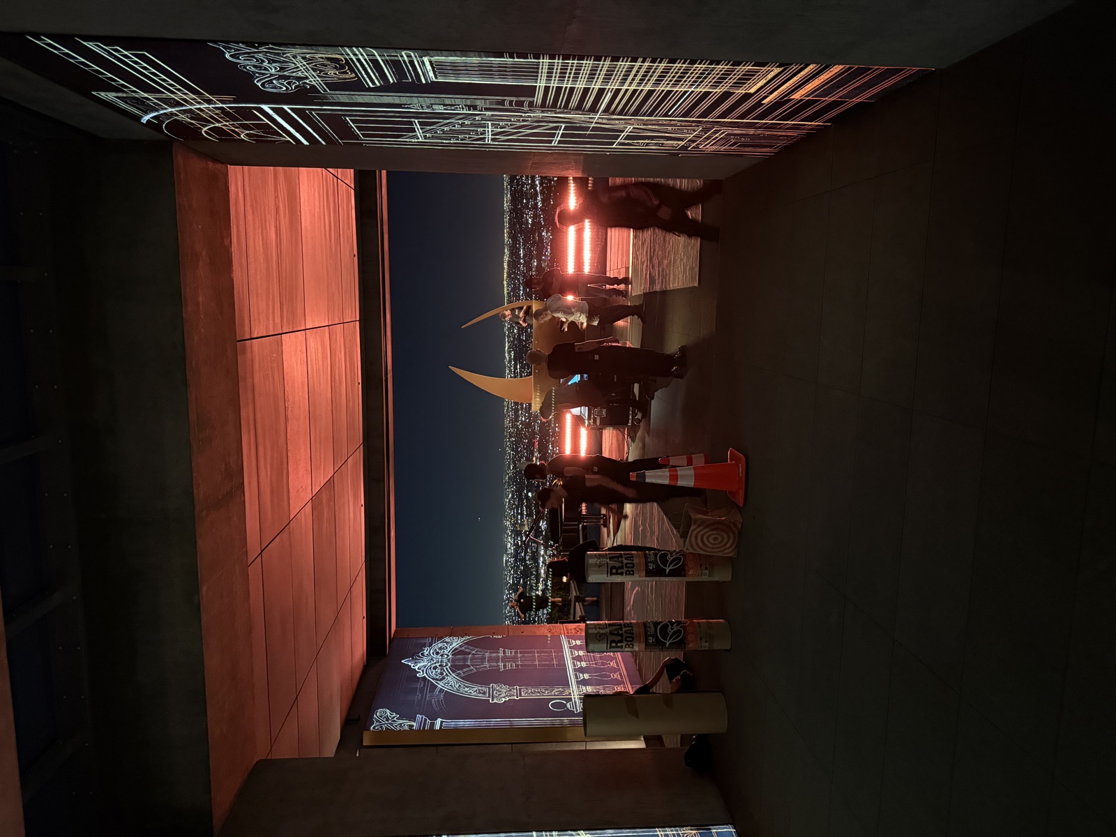 Wide view of projected graphics environment with city backdrop