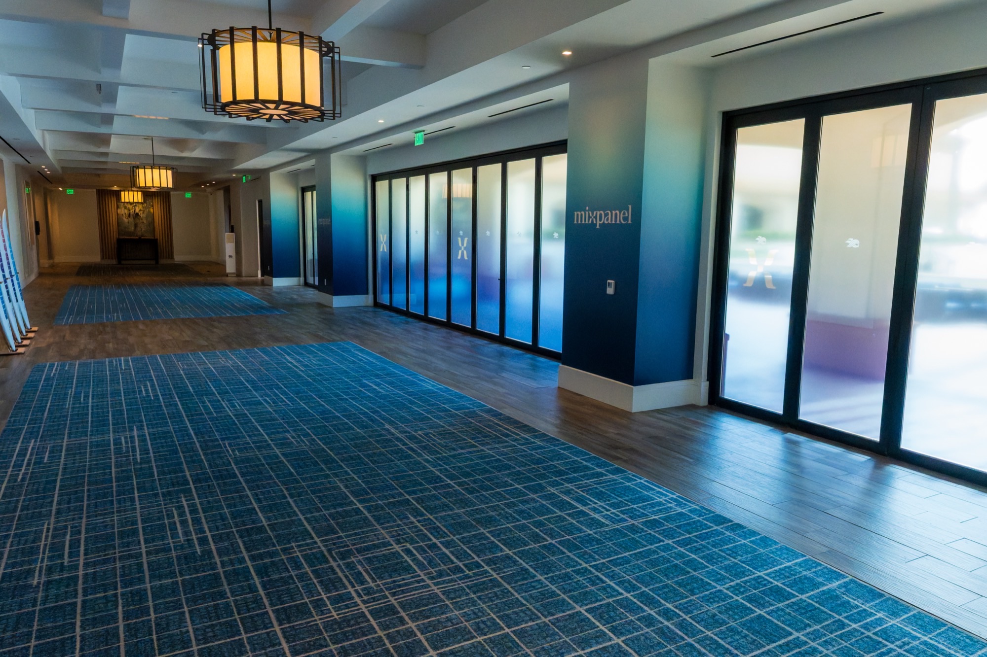 Interior hallway with Mixpanel wall graphics and translucent window film