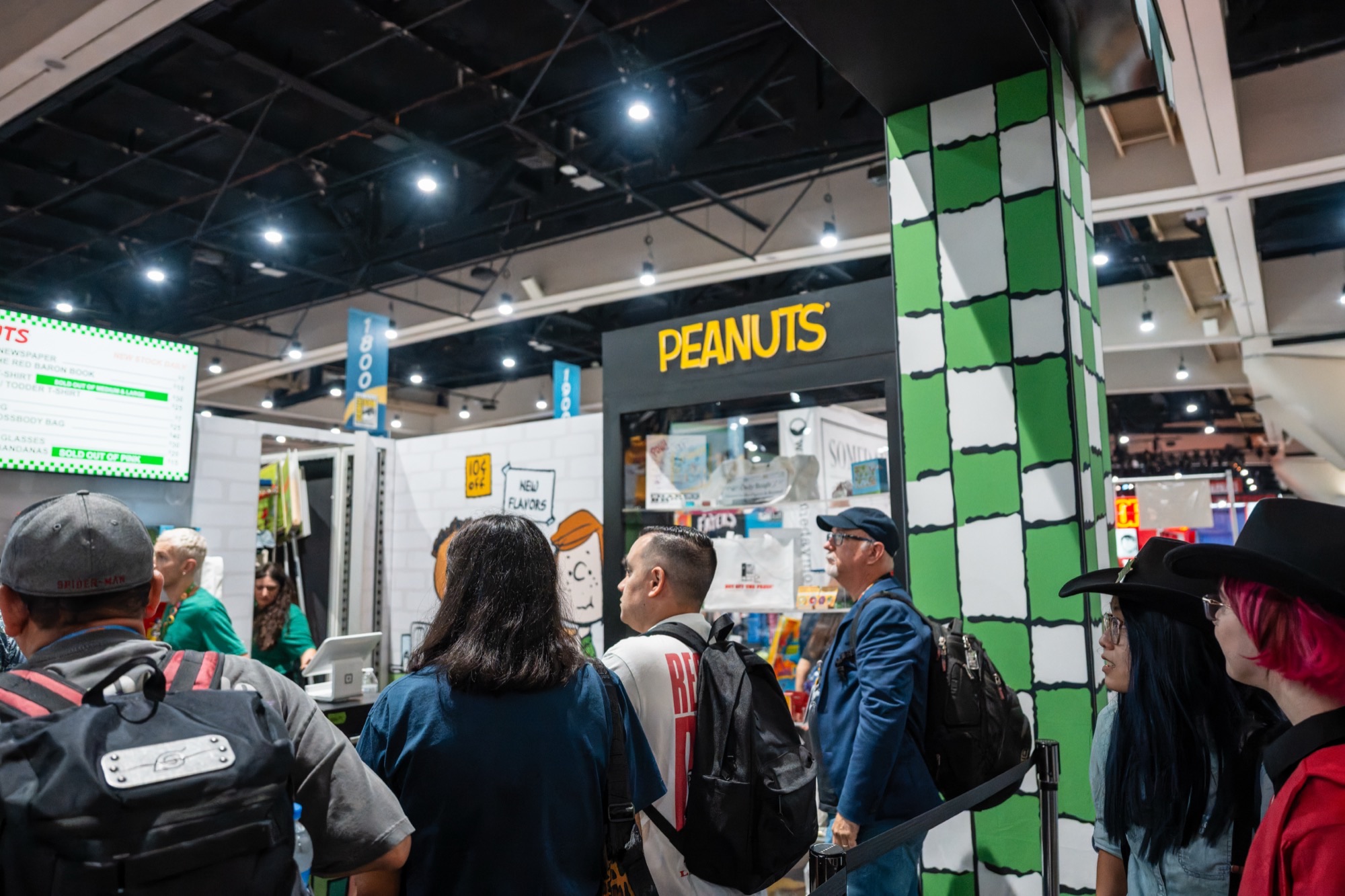 Peanuts convention booth with themed wall graphics and immersive environment at SDCC